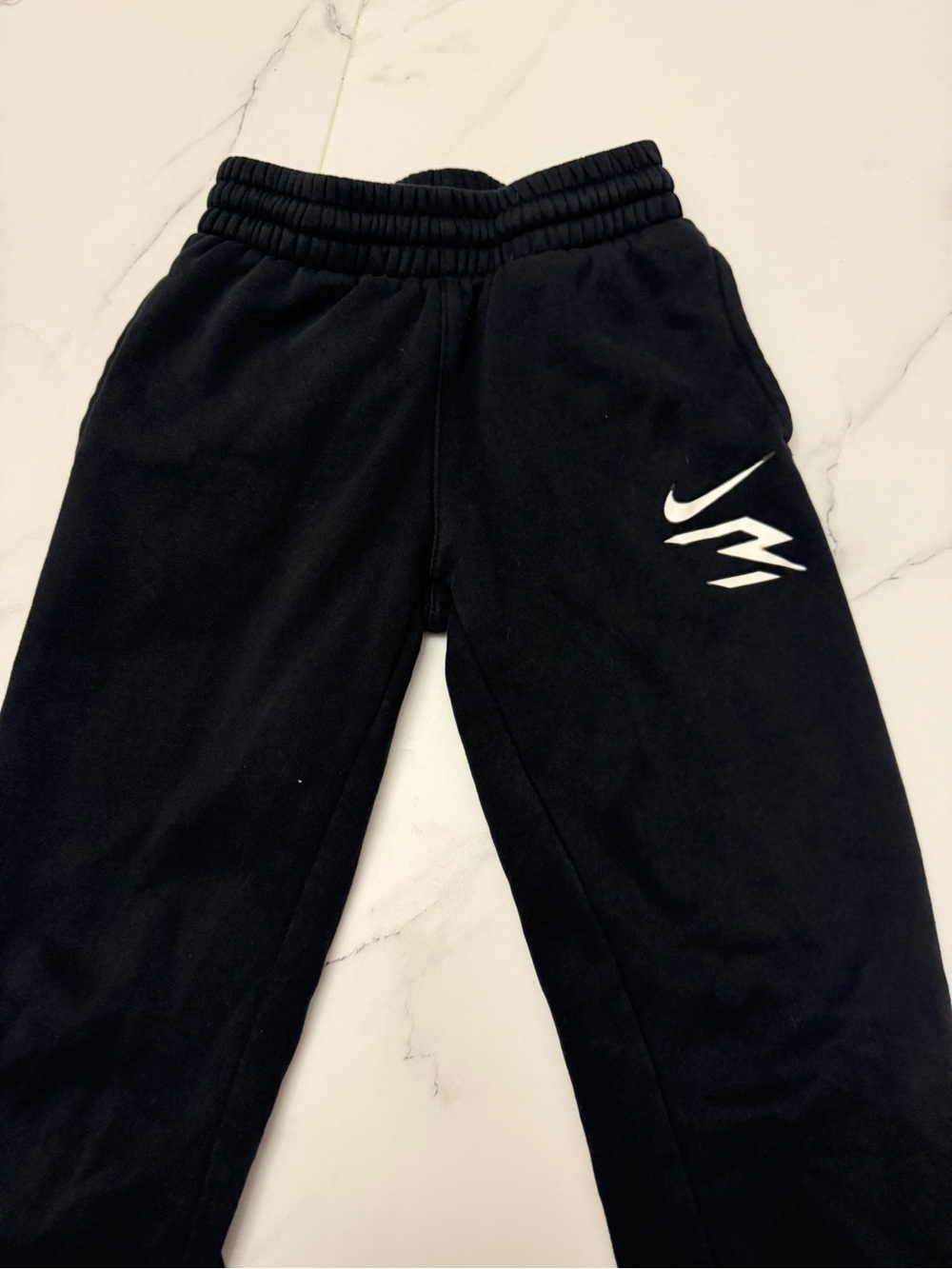 Nike Black Sweatpants with White Swoosh Graphic - Kids